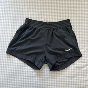Women’s NIKE shorts, gray, size medium